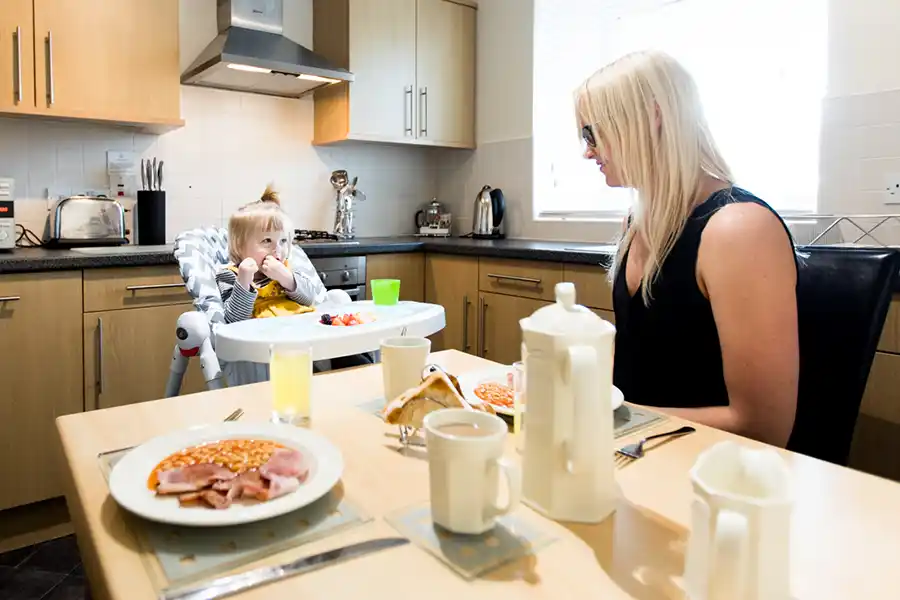 Mother and child at breakfast