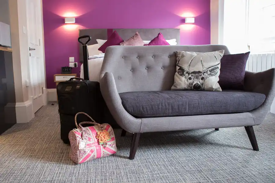 Sofa in bedroom at The Spires